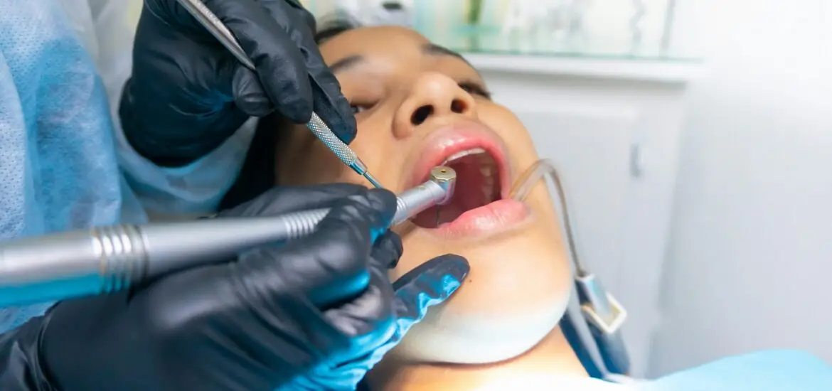 Patient receiving dental procedure.