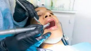 Patient receiving dental procedure.